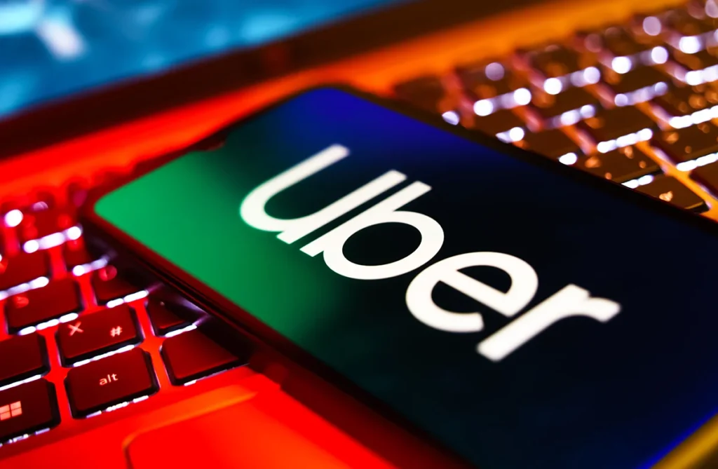 Uber Shares Slide as Massive Rivian Robotaxi Deal Sparks Wall Street Debate